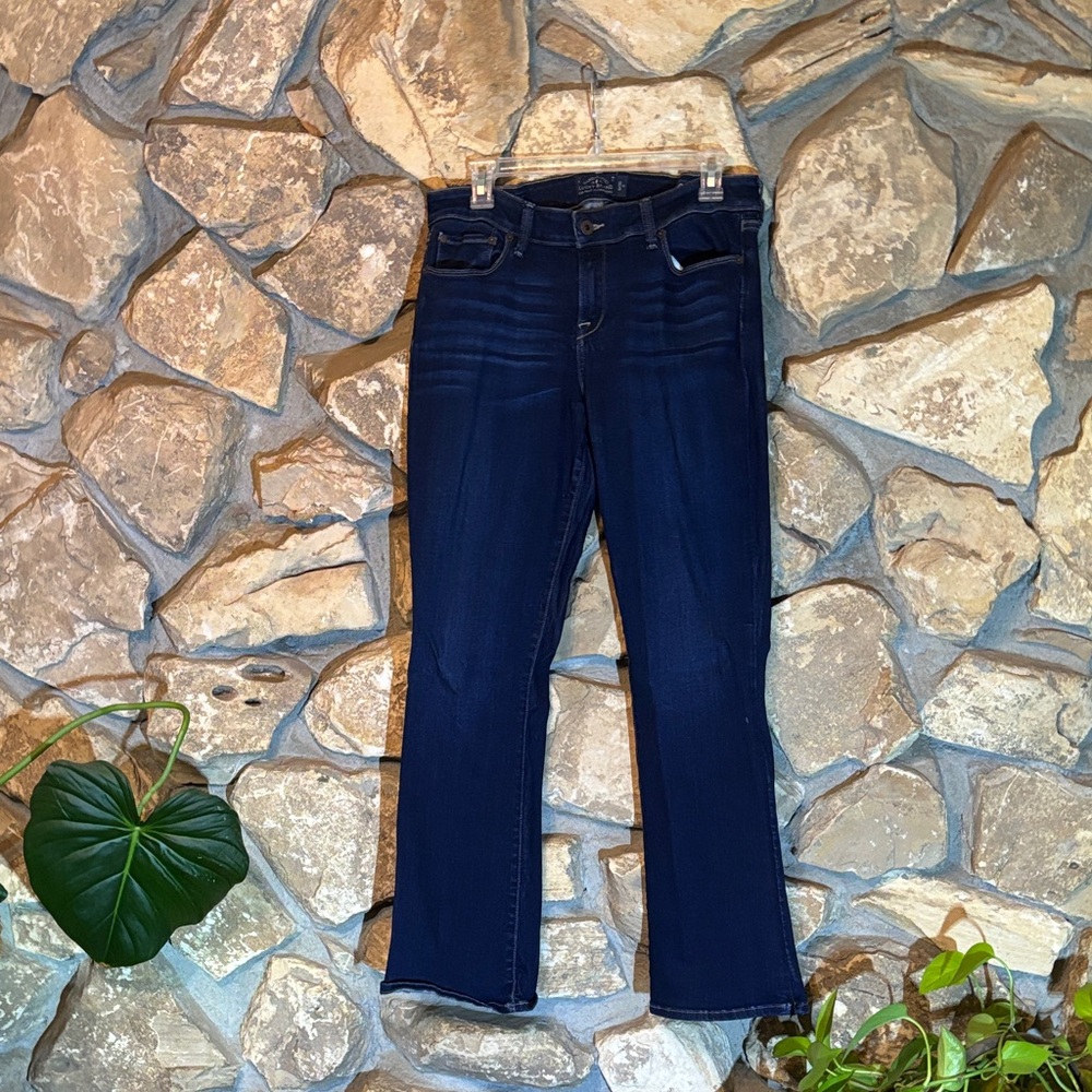 Stretchy boot cut mid rise dark jeans
